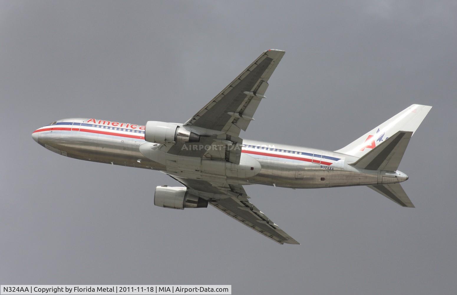 N324AA, 1986 Boeing 767-223 C/N 22325, American 767-200 departing 26L near photo holes.  Wind was basically shifting every hour, I think I put more miles on my car driving around MIA than the drive from Orlando to Miami