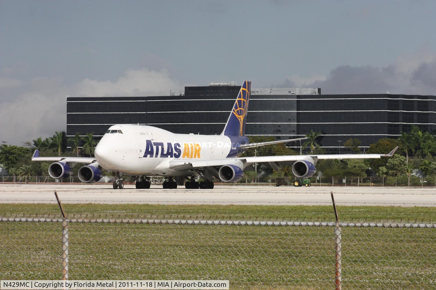 N429MC, 1990 Boeing 747-481 C/N 24833, The wind had just shifted back to the east.  The Atlas 747 was taxiing to take off on 27, but turned around to take off on 9.