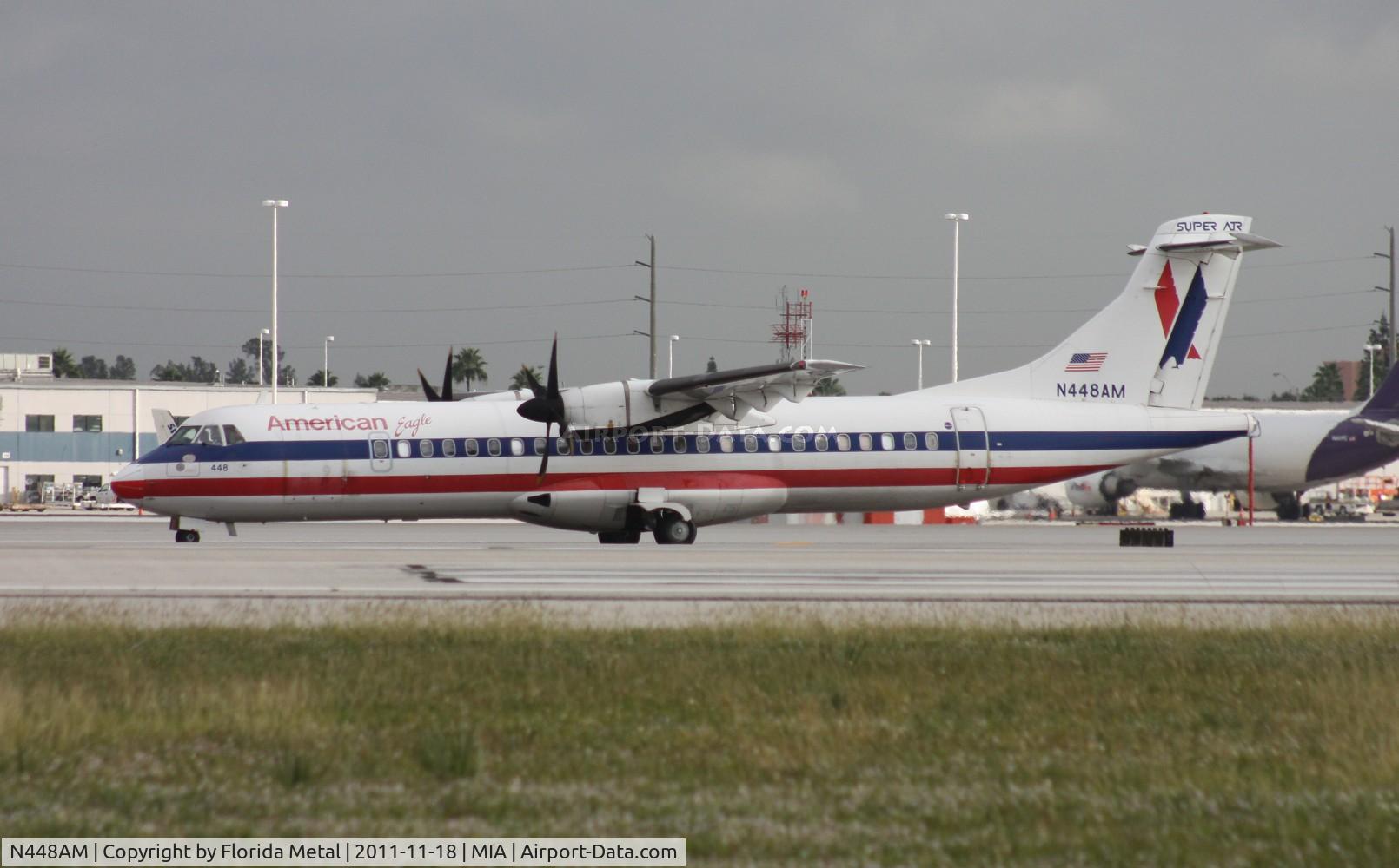 N448AM, 1995 ATR 72-212 C/N 448, Eagle ATR-72 departing by the holes