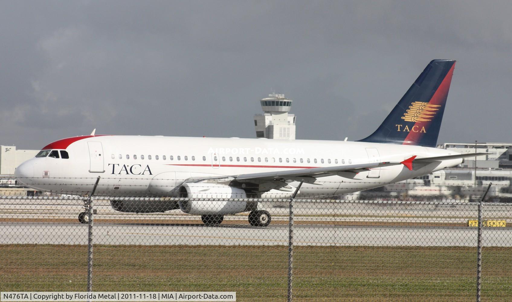 N476TA, 2003 Airbus A319-132 C/N 1934, Taca A319 departing 27 in front of 94th Aero Squadron