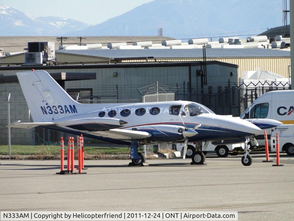 N333AM, 1975 Cessna 414 Chancellor C/N 414-0651, Parked behind the barricades