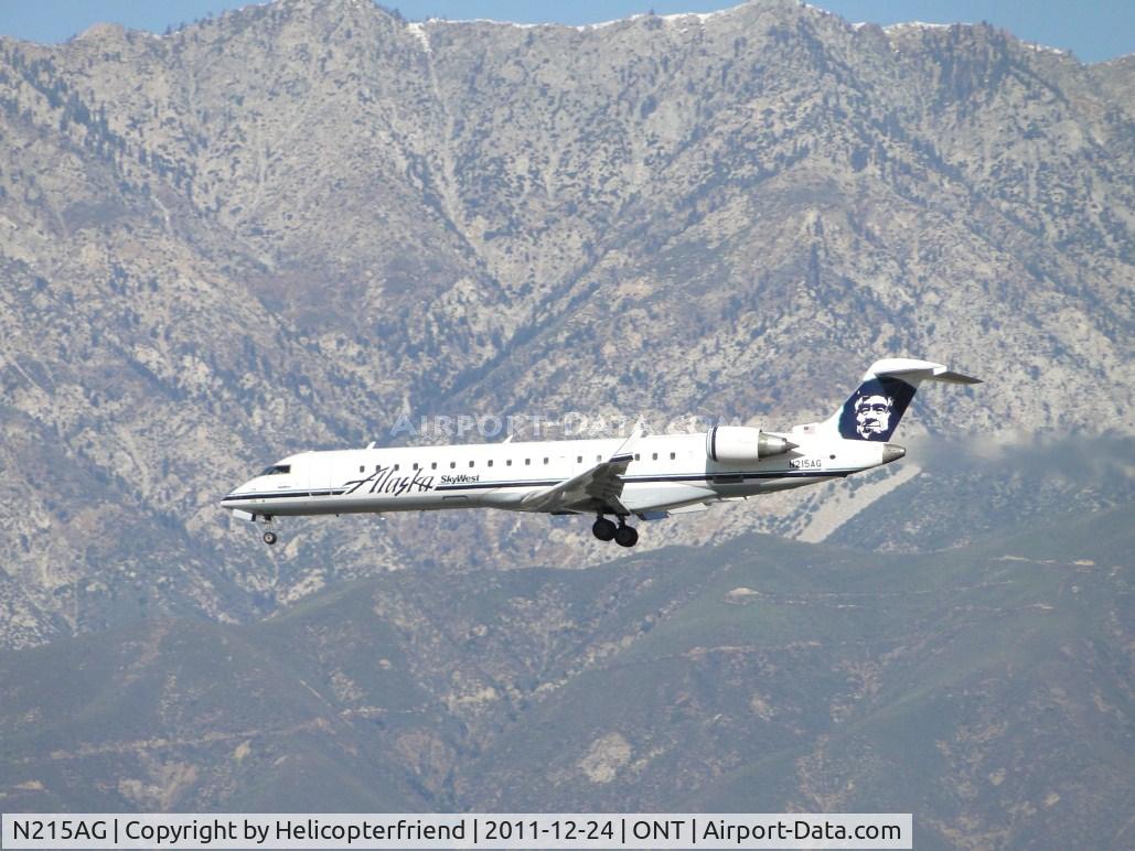 N215AG, 2000 Bombardier CRJ-701 (CL-600-2C10) Regional Jet C/N 10009, On final to runway 26L