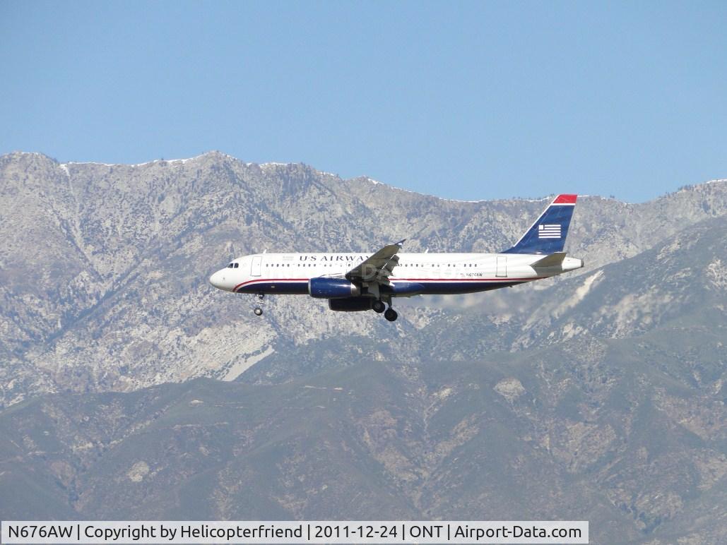 N676AW, 2005 Airbus A320-232 C/N 2422, On final for runway 26L