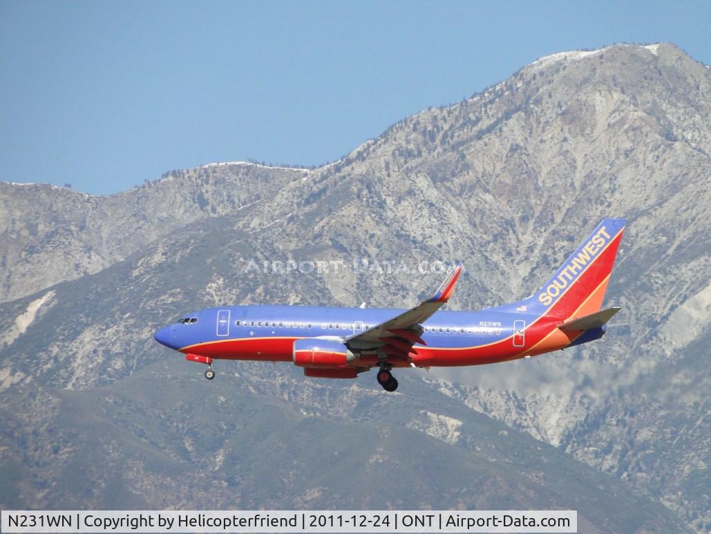 N231WN, 2006 Boeing 737-7H4 C/N 32499, On final for runway 26L