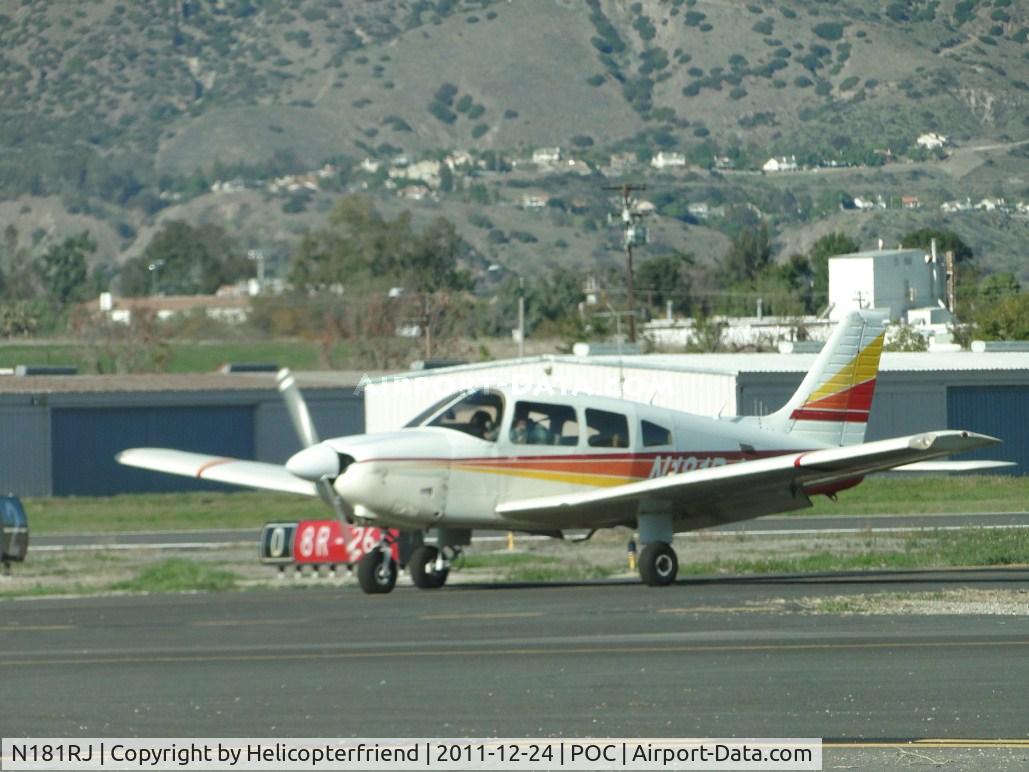 N181RJ, 1980 Piper PA-28-181 Archer II C/N 28-8190106, Just landed on runway 26L and waiting to taxi to parking area on the east side
