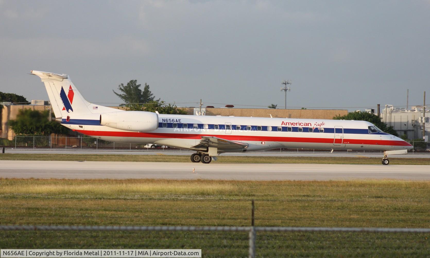 N656AE, 2003 Embraer ERJ-145LR (EMB-145LR) C/N 145740, Same Eagle plane later in the day departing Runway 9 in front of El Dorado