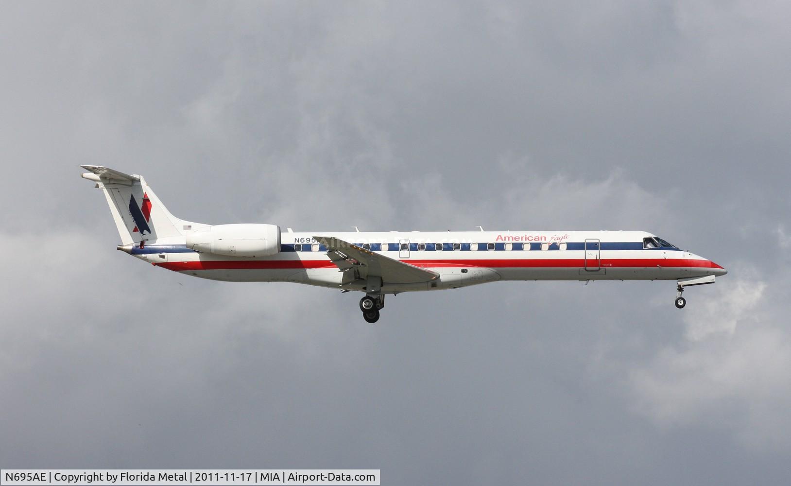 N695AE, 2004 Embraer ERJ-145LR (EMB-145LR) C/N 14500870, Eagle E145 landing Runway 9