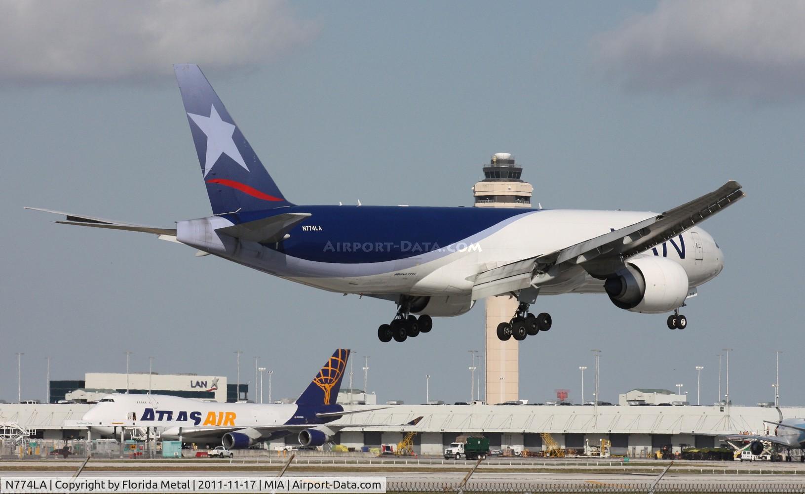 N774LA, 2009 Boeing 777-F6N C/N 37710, LAN Colombia Cargo passing by Cargo City where it would be parking after it lands