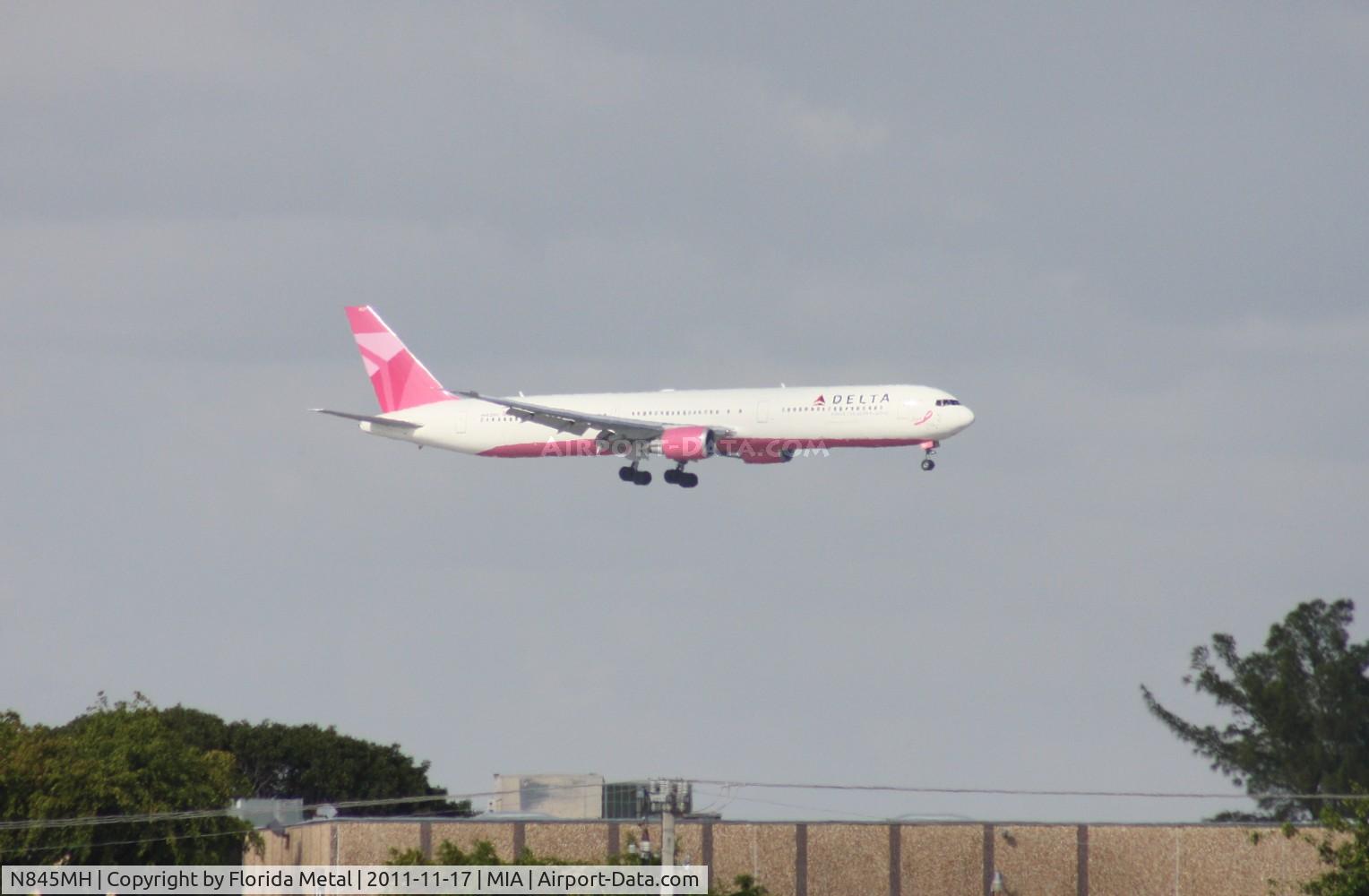 N845MH, 2002 Boeing 767-432/ER C/N 29719, I had a choice here.  I have wanted the Delta pink plane that is landing on Runway 12, I am by 9.  Had I gone to 12- I would have missed the A380 that just landed, as well as the TAB DC-10 and Air One A330 on final