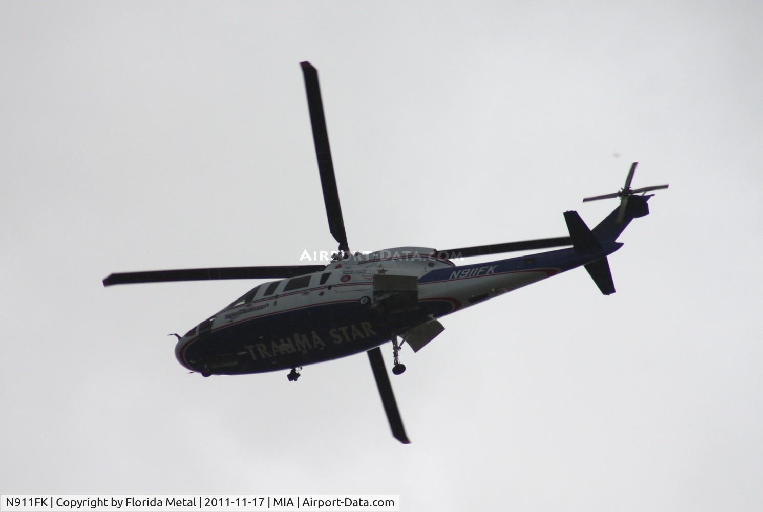 N911FK, 1981 Sikorsky S-76A C/N 760197, Miami Dade Hospital S-76 passing over