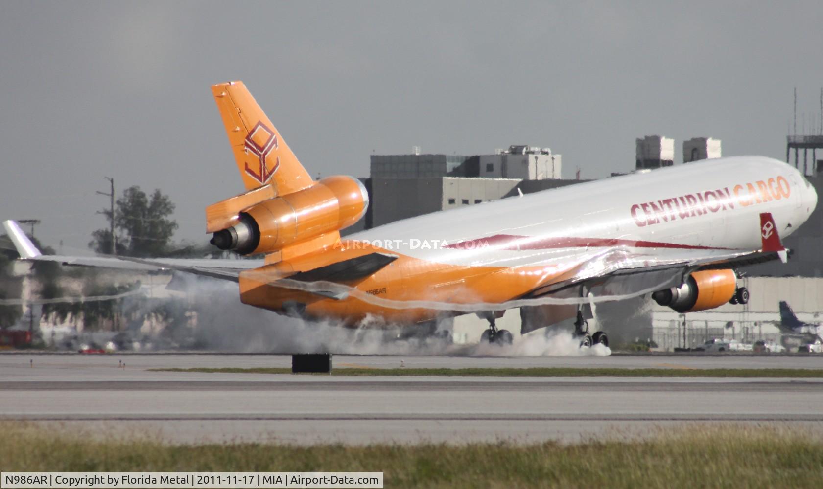 N986AR, 1991 McDonnell Douglas MD-11F C/N 48426, Centurion smokey touch down on 8L