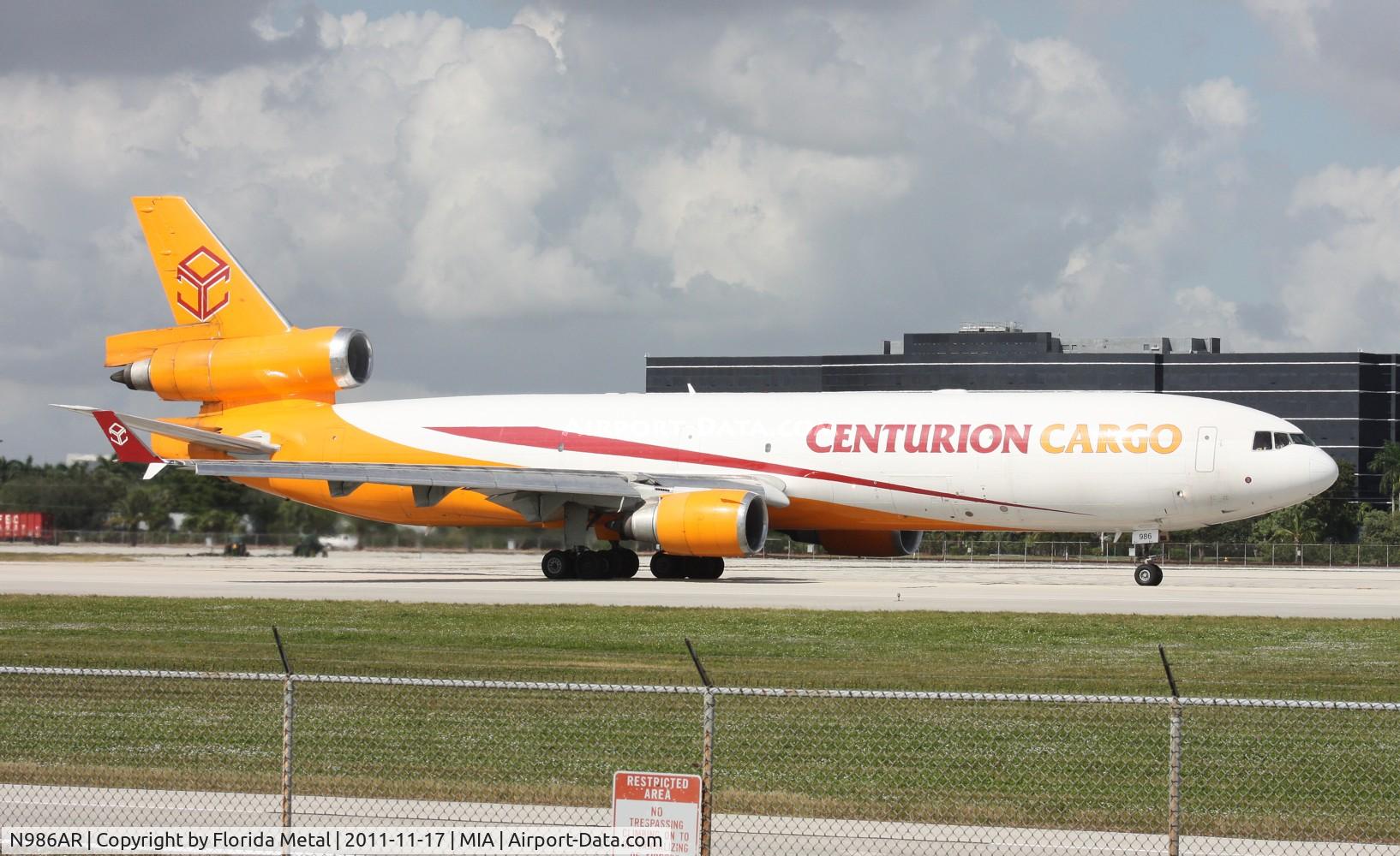 N986AR, 1991 McDonnell Douglas MD-11F C/N 48426, Centurion rolling past El Dorado
