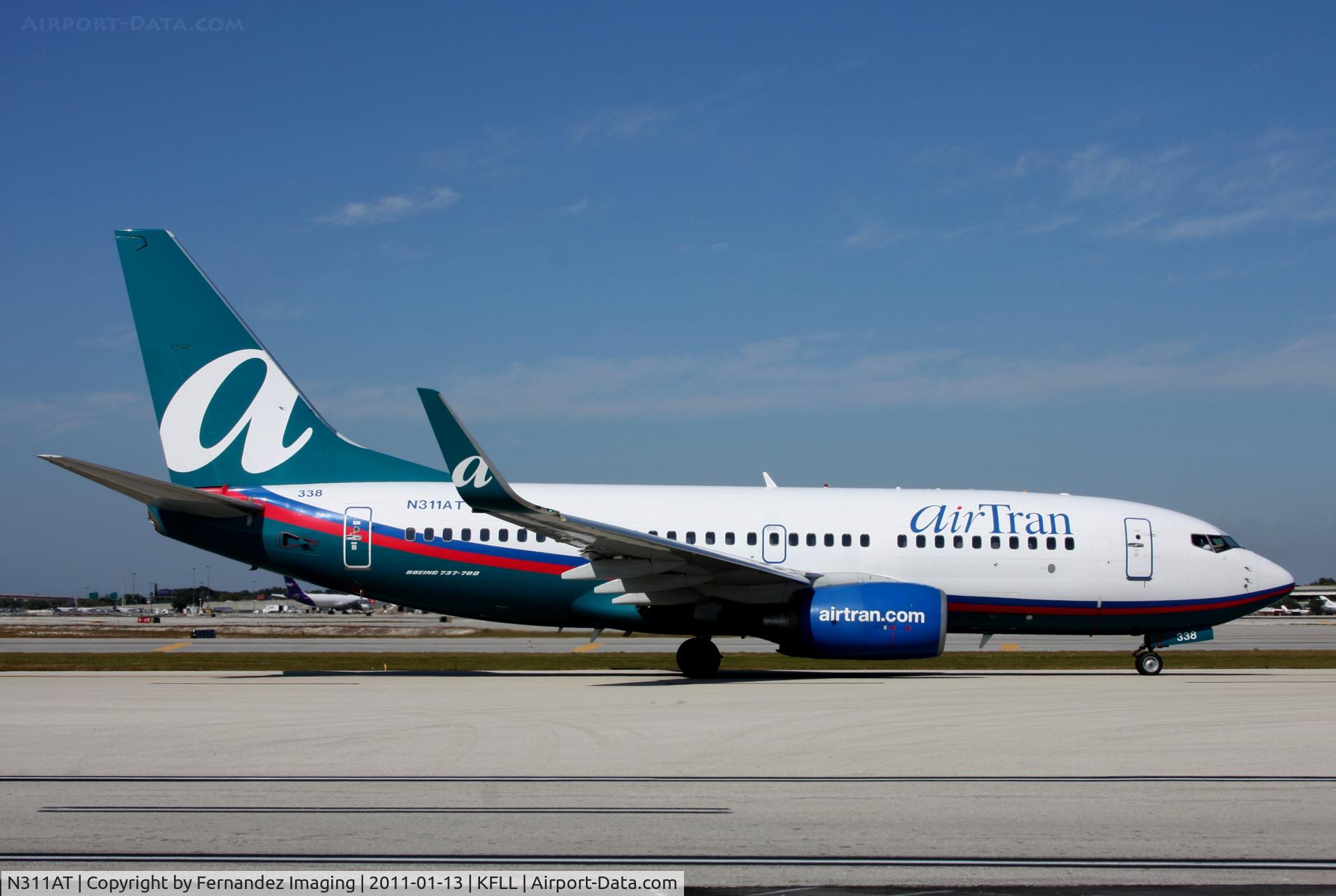 N311AT, 2006 Boeing 737-7BD C/N 33930, Prepares to depart Ft Lauderdale