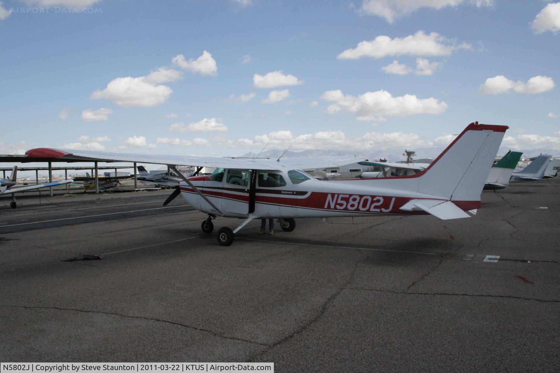 N5802J, 1980 Cessna 172N C/N 17273839, Taken at Tucson International Airport, in March 2011 whilst on an Aeroprint Aviation tour. This aircraft took me on an overflight of the Davis Monthan storage yard - a life long ambition completed.