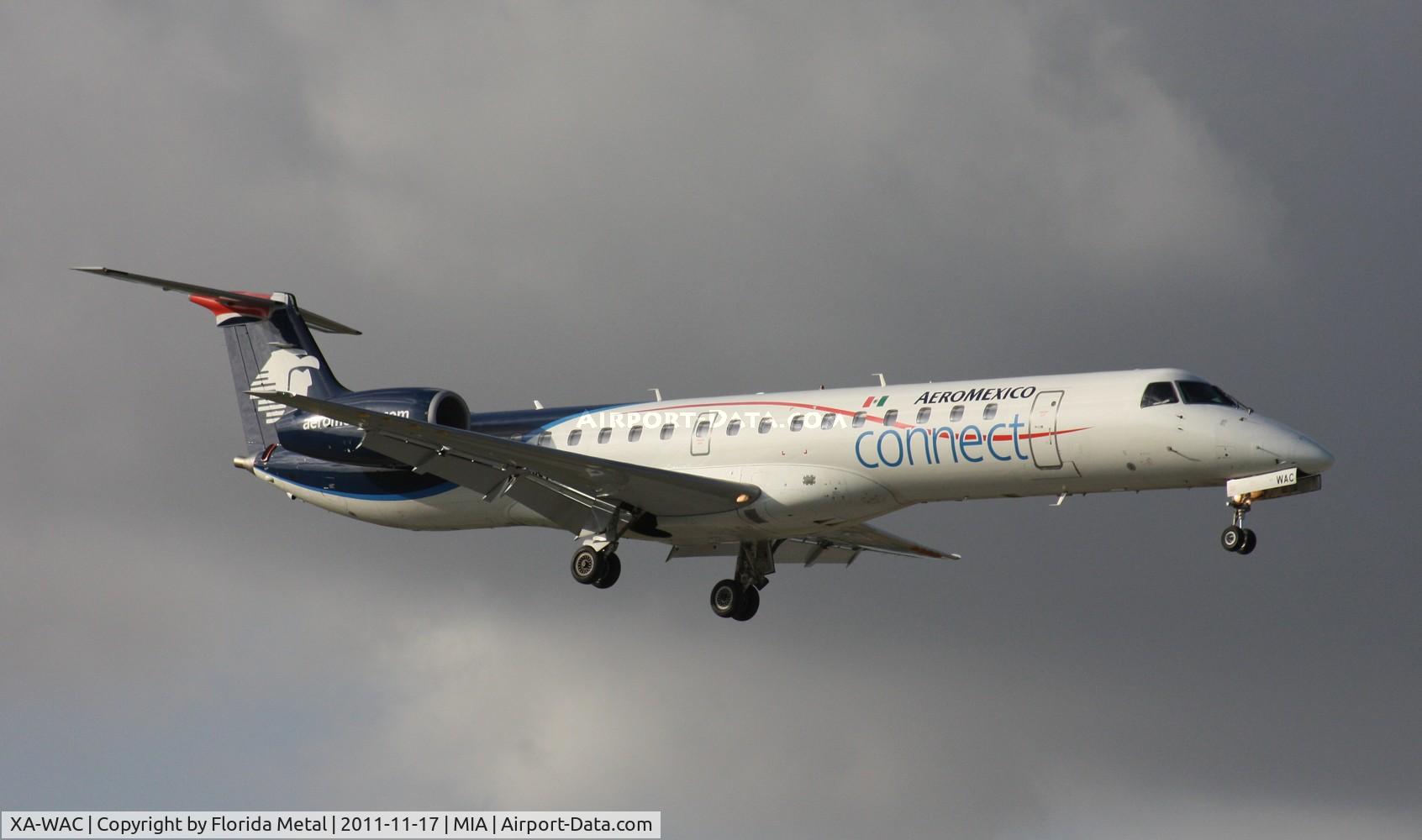 XA-WAC, 2000 Embraer ERJ-145LR (EMB-145LR) C/N 145255, Tower said Aerosur on approach - I was getting excited but Sharko was sitting at the gate already so I thought maybe it was one of their 727s but turns out it was just this Aeromexico Connect RJ