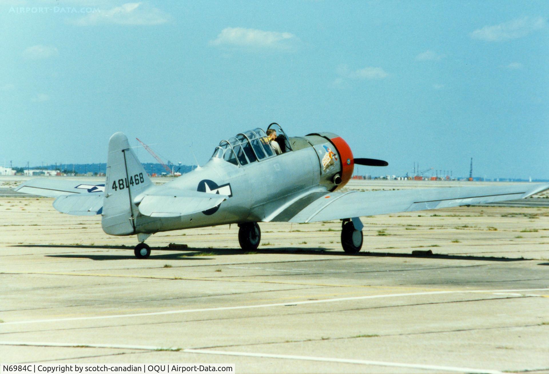 N6984C, 1944 North American AT-6D Texan C/N 44-81468, 1944 North American AT-6D N6984C at Quonset State Airport, North Kingstown, RI - circa 1980's