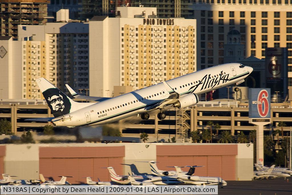 N318AS, 2003 Boeing 737-990 C/N 30018, Alaska Airlines N318AS (FLT ASA617) climbing out from RWY 1R en route to Seattle-Tacoma Int'l (KSEA).