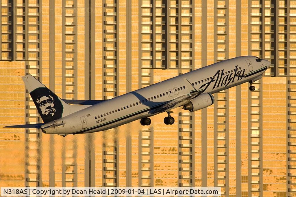 N318AS, 2003 Boeing 737-990 C/N 30018, Alaska Airlines N318AS (FLT ASA617) climbing out from RWY 1R en route to Seattle-Tacoma Int'l (KSEA).