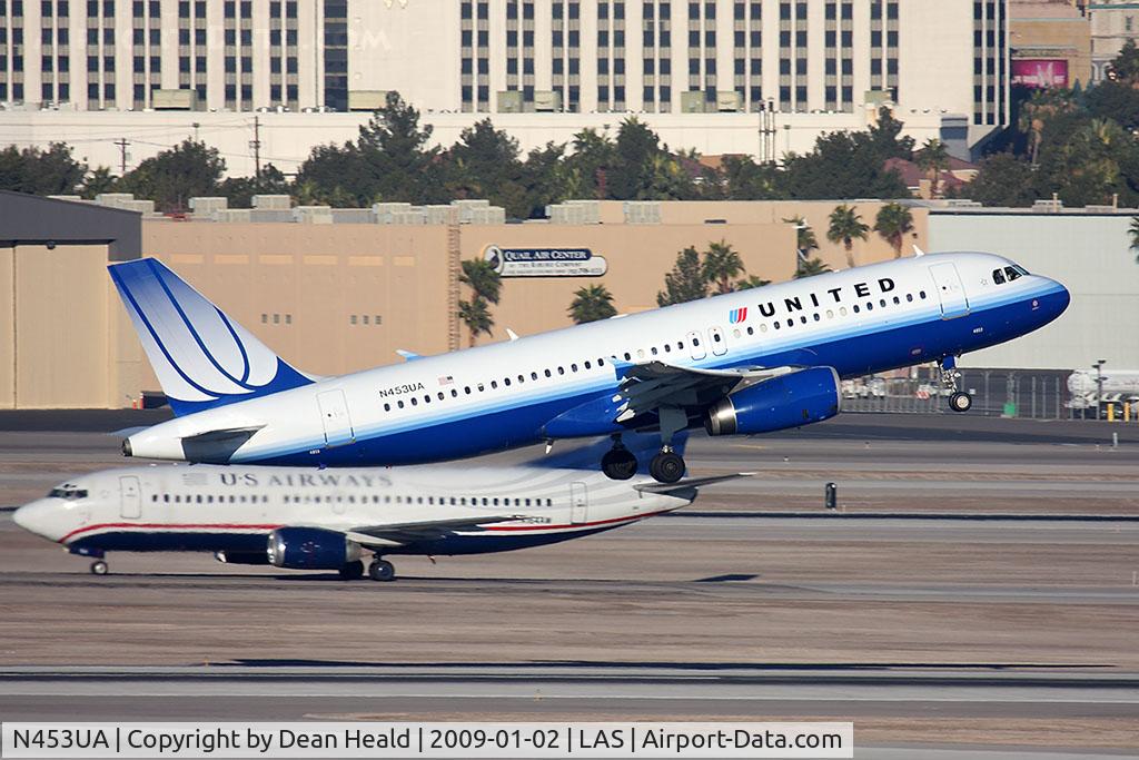 N453UA, 1999 Airbus A320-232 C/N 1001, United Airlines N453UA (FLT UAL1596) departing RWY 1R en route to Denver Int'l (KDEN).