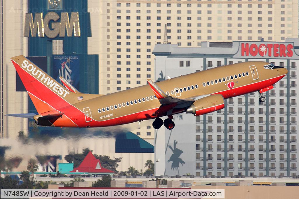 N748SW, 1999 Boeing 737-7H4 C/N 29800, Southwest Airlines N748SW (FLT SWA3678) climbing out from RWY 1R en route to San Diego Int'l (KSAN).