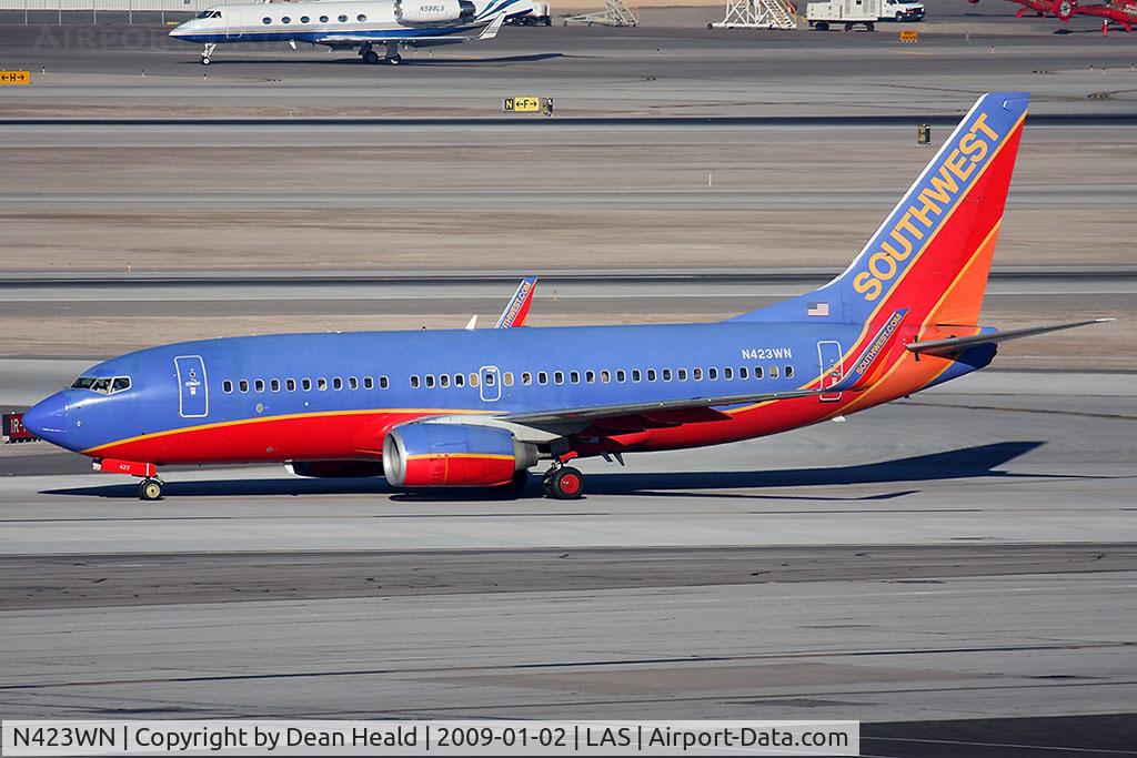 N423WN, 2002 Boeing 737-7H4 C/N 29827, Southwest Airlines N423WN (FLT SWA1808) taxiing to the gate after arrival on RWY 1L from Ontario Int'l (KONT).