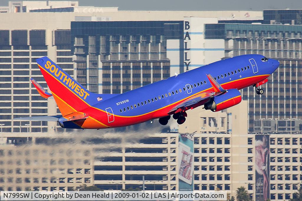 N799SW, 1998 Boeing 737-7Q8 C/N 28209, Southwest Airlines N799SW (FLT SWA1590) climbing out from RWY 1R en route to Austin-Bergstrom Int'l (KAUS).