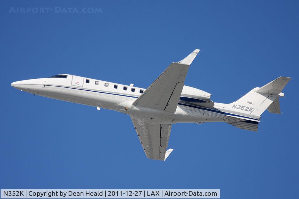 N352K, Learjet Inc 45 C/N 215, Kiewit Engineering Company's 2002 Bombardier Learjet 45 N352K climbing out from RWY 25L en route to Reno/Tahoe Int'l (KRNO).