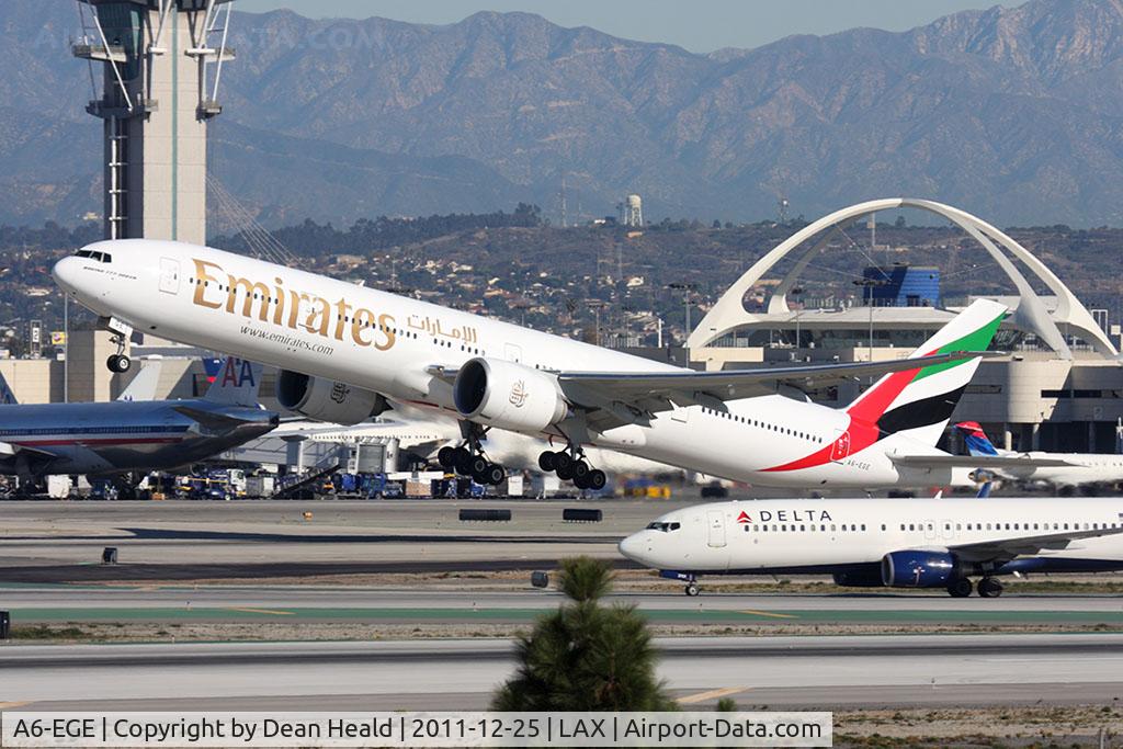 A6-EGE, 2011 Boeing 777-31H/ER C/N 35597, Emirates A6-EGE (FLT UAE218) departing RWY 25R en route to Dubai Int'l (OMDB/DXB).