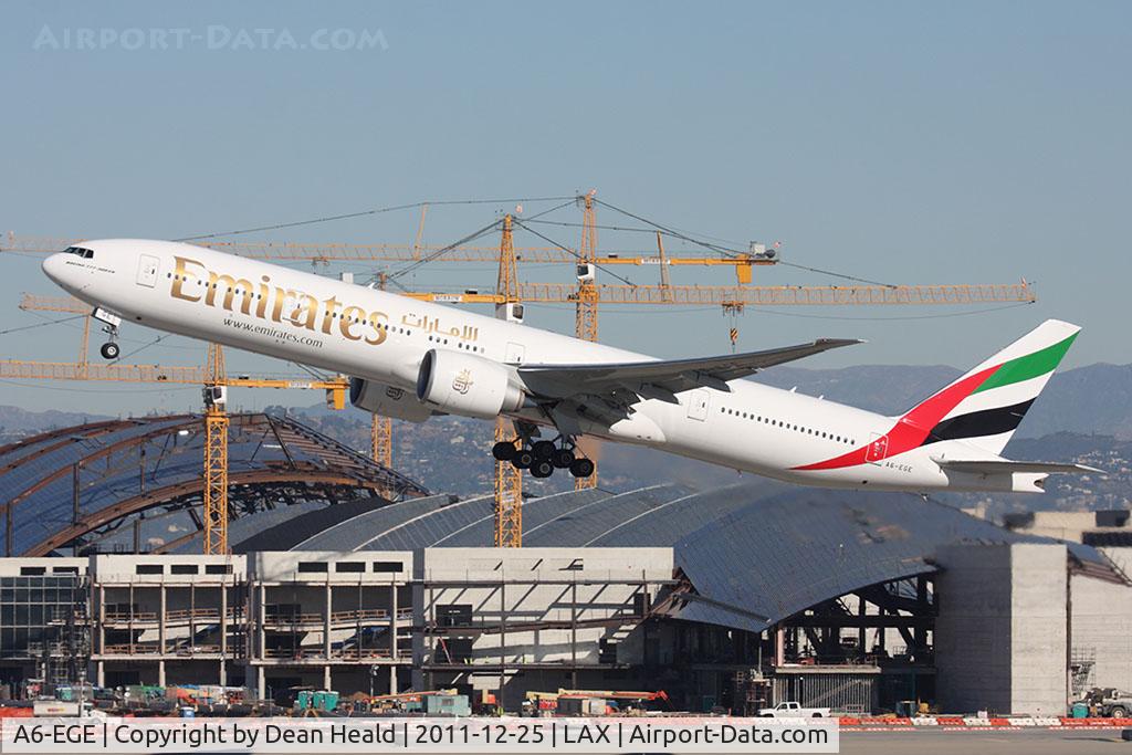 A6-EGE, 2011 Boeing 777-31H/ER C/N 35597, Emirates A6-EGE (FLT UAE218) departing RWY 25R en route to Dubai Int'l (OMDB/DXB).