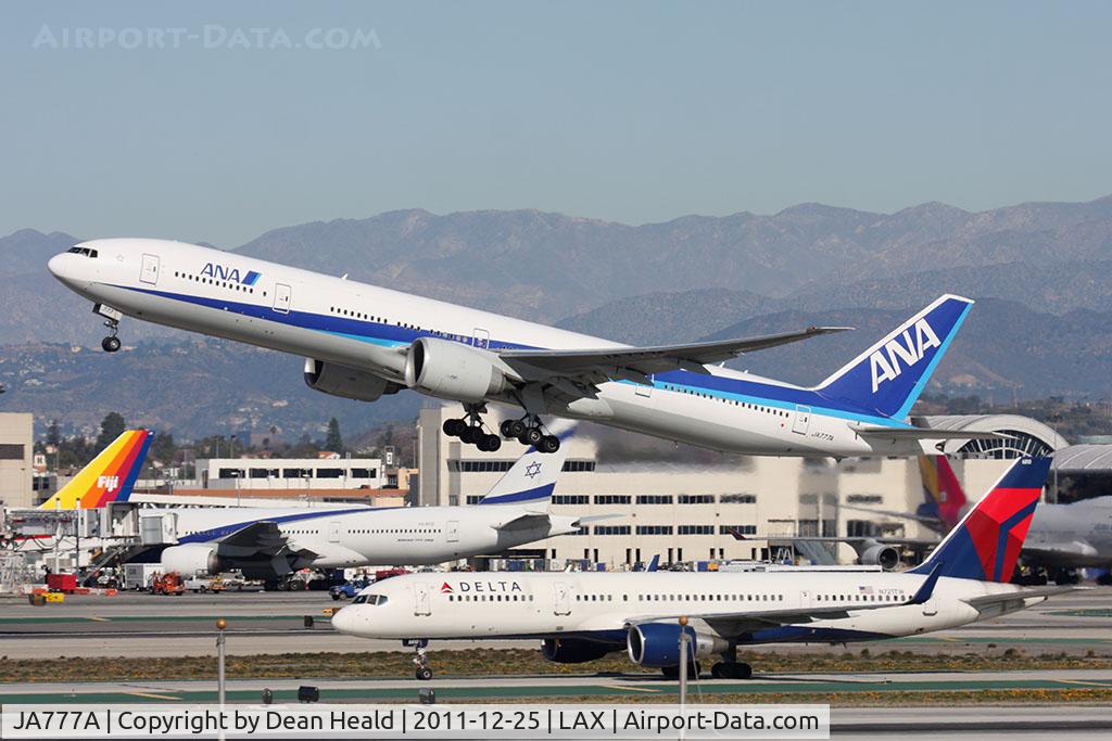 JA777A, 2006 Boeing 777-381/ER C/N 32650, All Nippon Airways JA777A (FLT ANA5) departing RWY 25R en route to Tokyo Narita Int'l (RJAA/NRT).