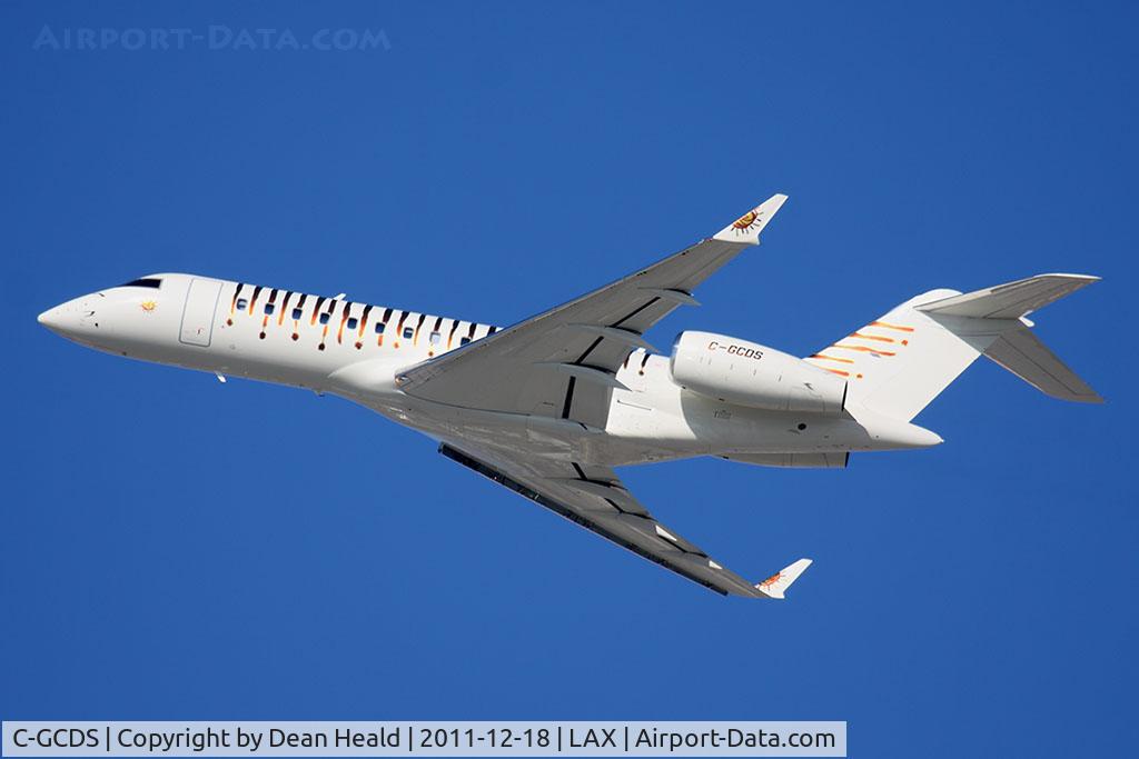 C-GCDS, 2003 Bombardier BD-700-1A10 Global Express C/N 9137, Cirque Du Soleil's 2003 Bombardier BD-700-1A10 Global Express C-GCDS climbing out from RWY 25R.
