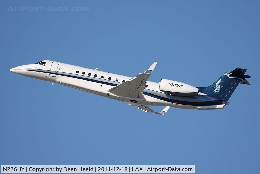 N226HY, 2007 Embraer EMB-135BJ Legacy C/N 14501014, 2007 Embraer EMB-135BJ Legacy 600 N226HY climbing out from RWY 25R.