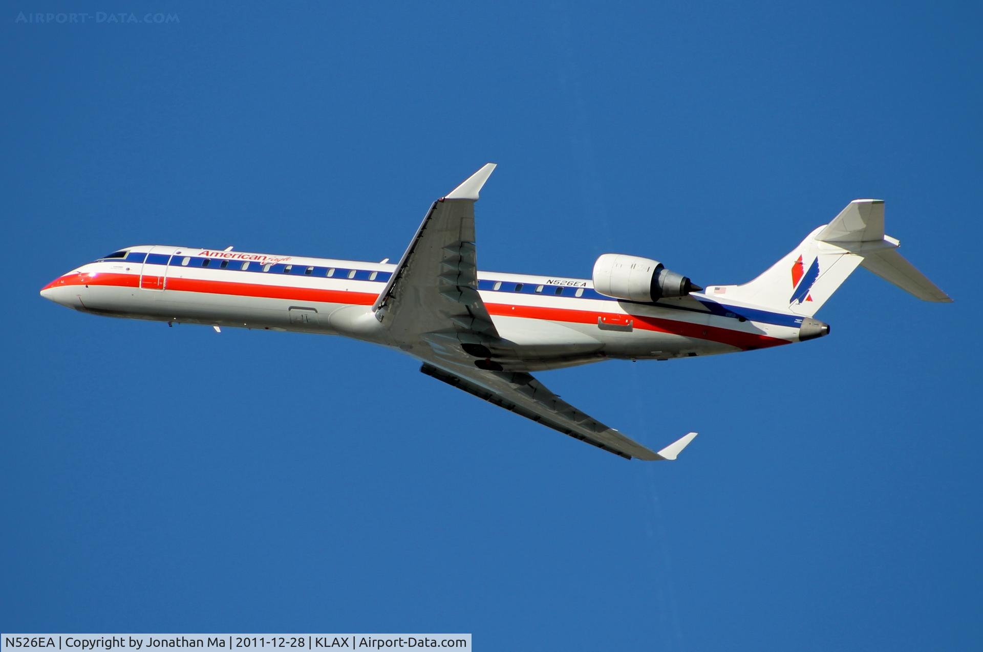 N526EA, Bombardier CRJ-702 (CL-600-2C10) Regional Jet C/N 10304, American Eagle CRJ rockets away from LAX
