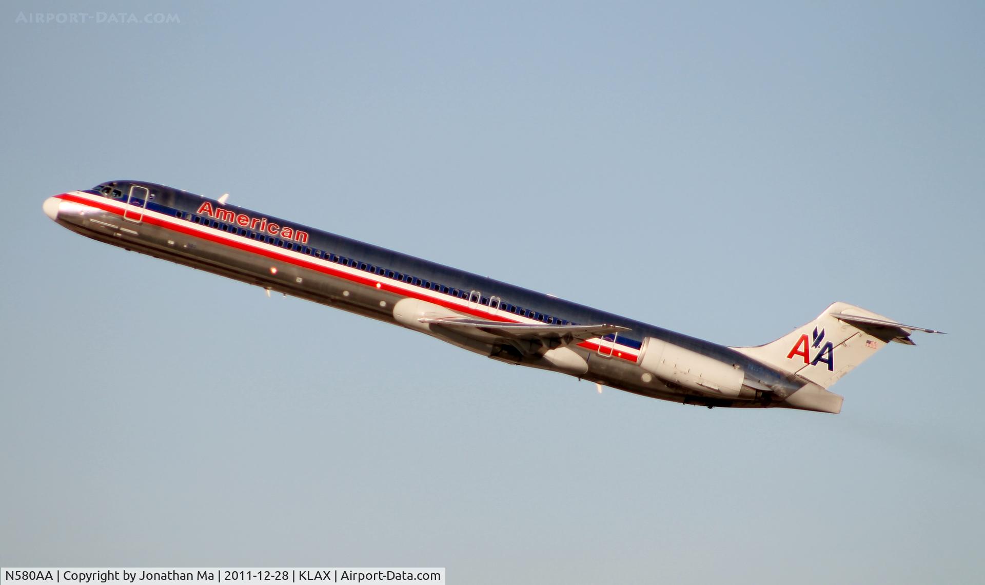 N580AA, 1991 McDonnell Douglas MD-82 (DC-9-82) C/N 53157, N580AA flies away with all the gears retracted