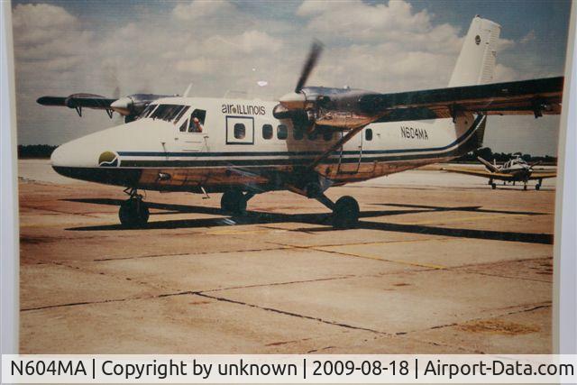 N604MA, 1969 De Havilland Canada DHC-6-200 Twin Otter C/N 218, sitting on tarmac in Carbondale Ill. My dad is the pilot sitting at controls.