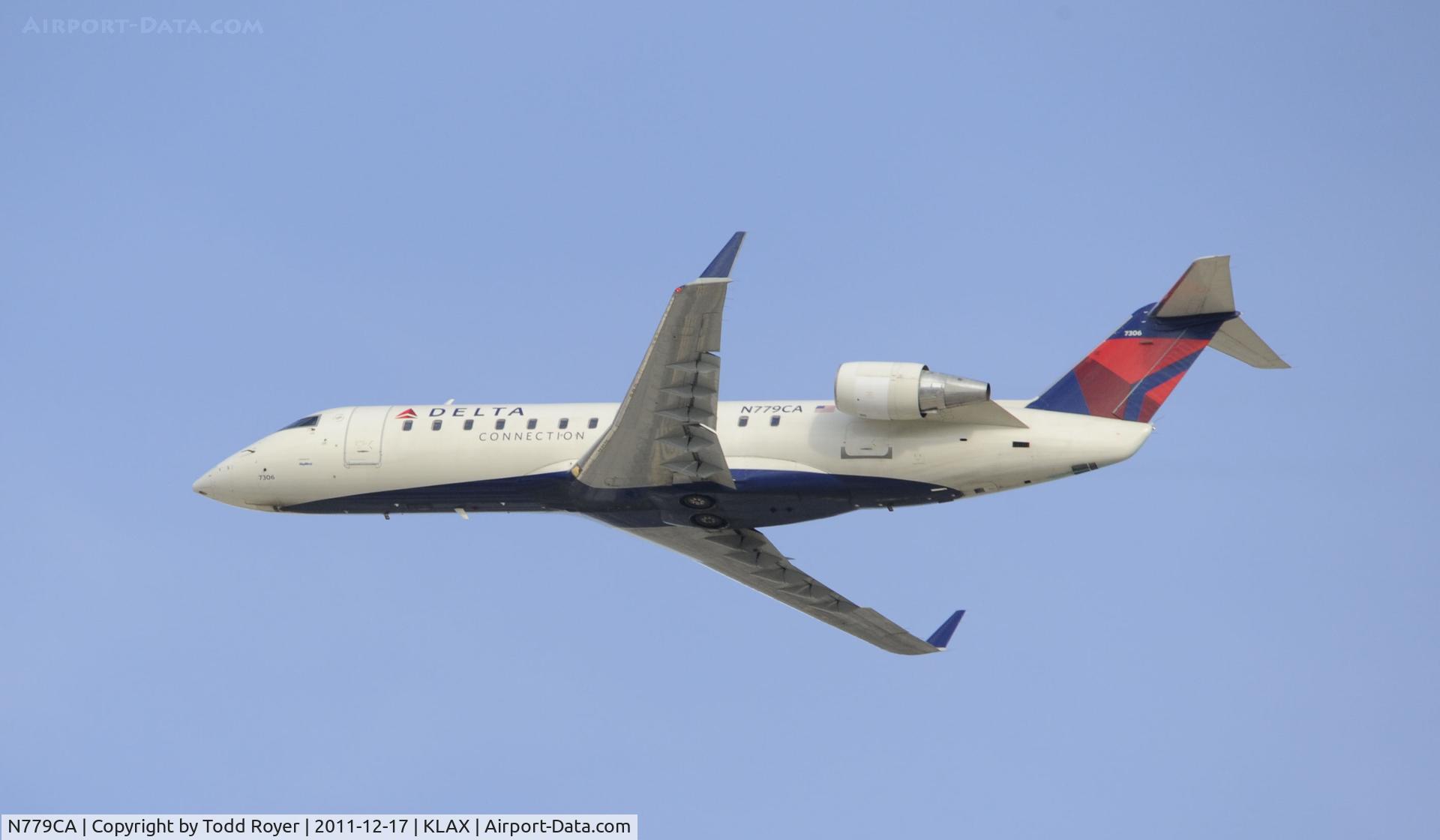 N779CA, 1999 Bombardier CRJ-100ER (CL-600-2B19) C/N 7306, Departing LAX