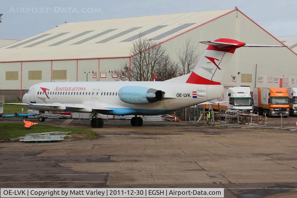 OE-LVK, 1992 Fokker 100 (F-28-0100) C/N 11397, Being pushed to Air Livery hangar 3 for spray.