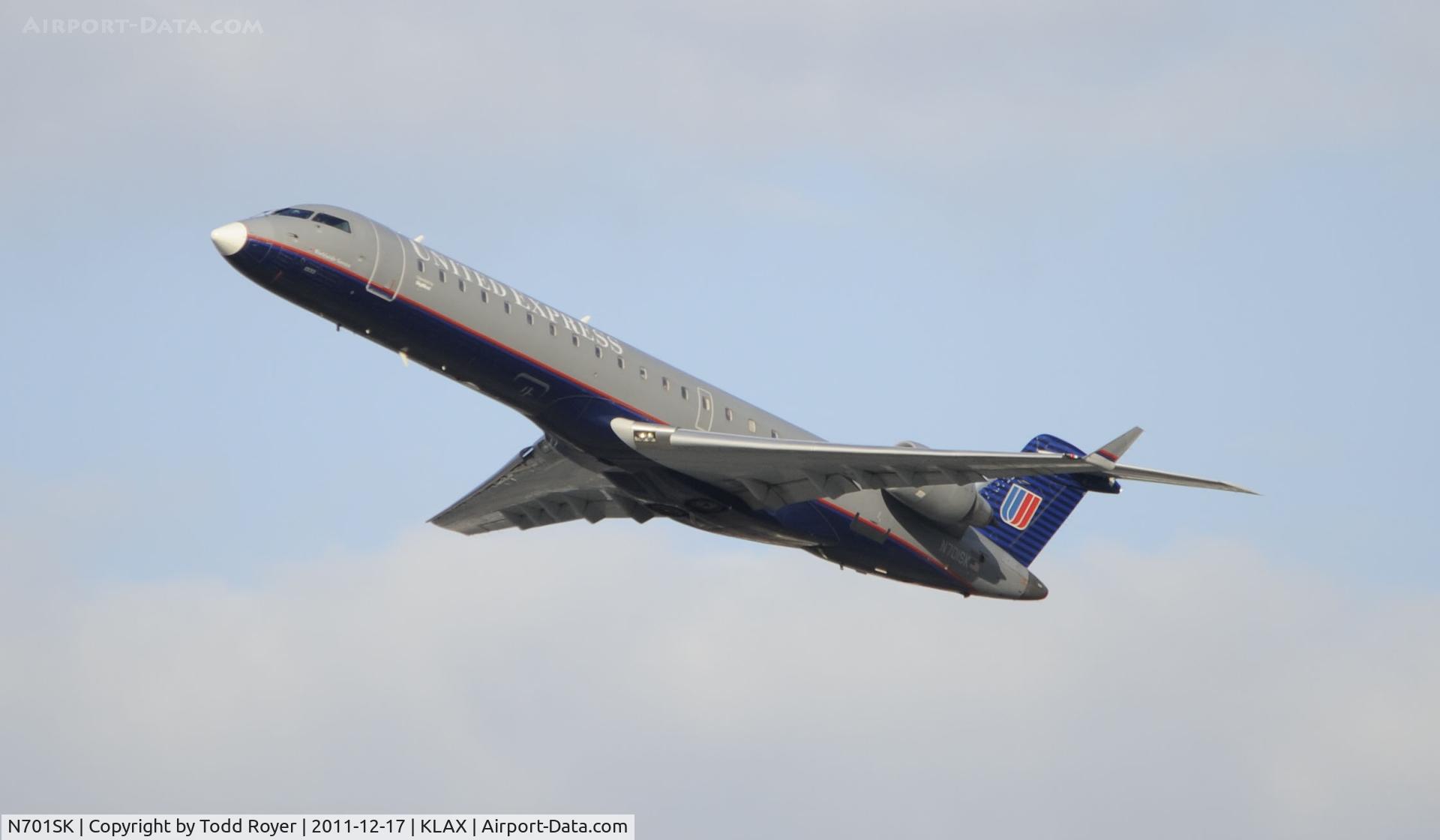 N701SK, 2004 Bombardier CRJ-700 (CL-600-2C10) Regional Jet C/N 10133, Departing LAX