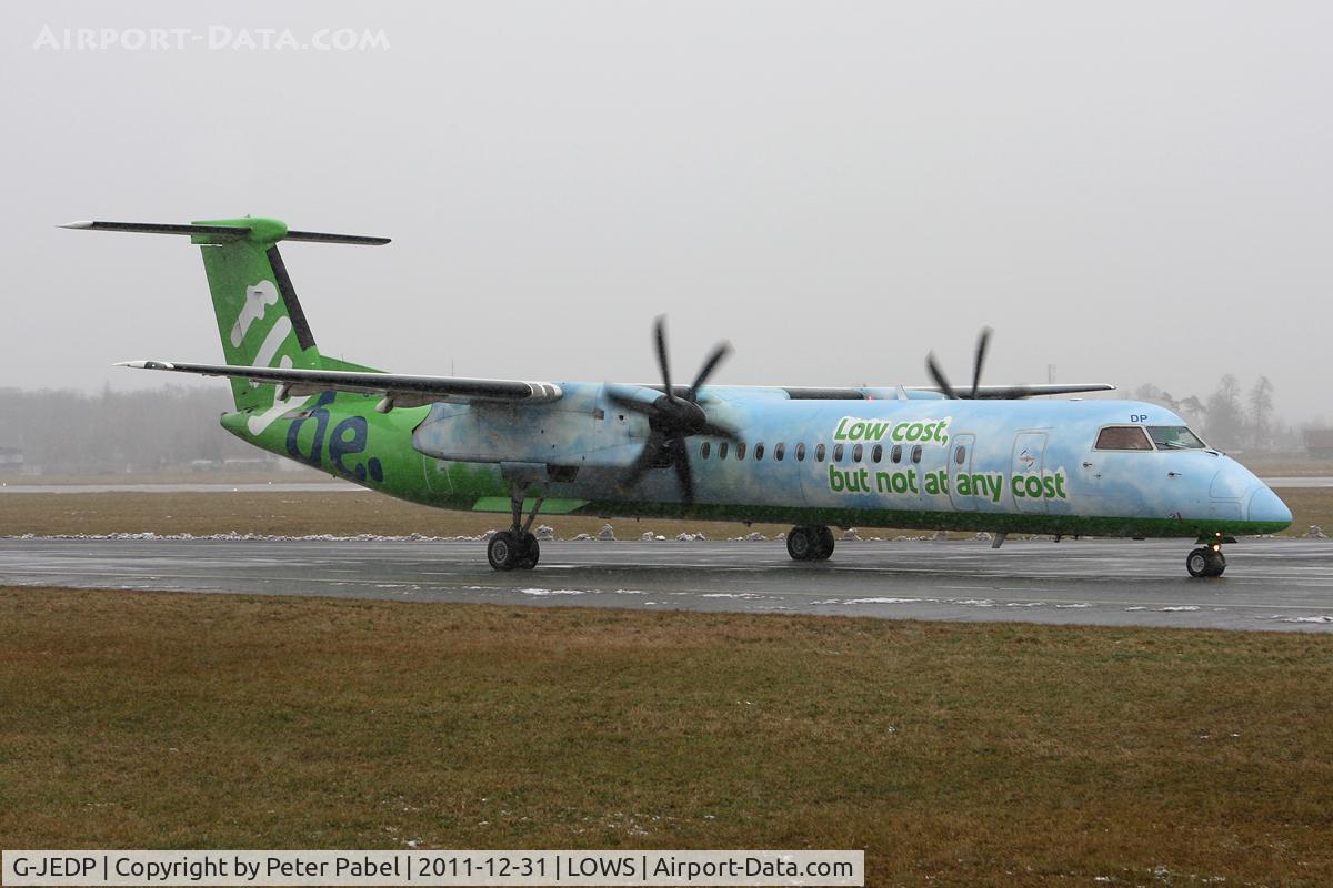 G-JEDP, 2003 De Havilland Canada DHC-8-402Q Dash 8 C/N 4085, SZG