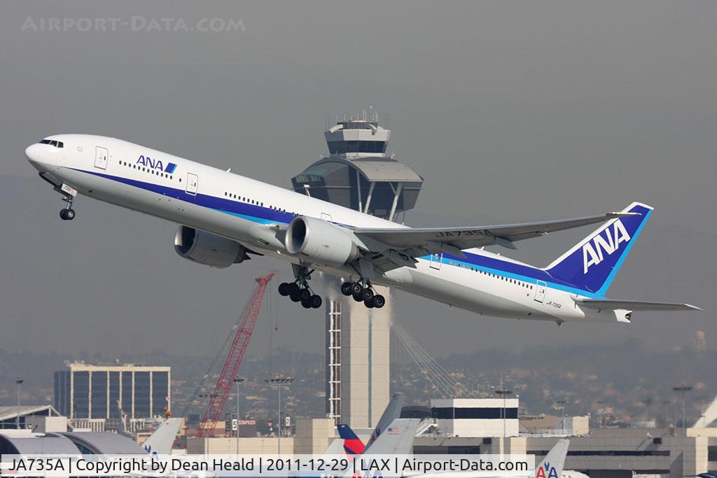 JA735A, 2006 Boeing 777-381/ER C/N 34892/571, All Nippon Airways JA735A (FLT ANA5) climbing out from RWY 25R en route to Tokyo Narita Int'l (RJAA/NRT).