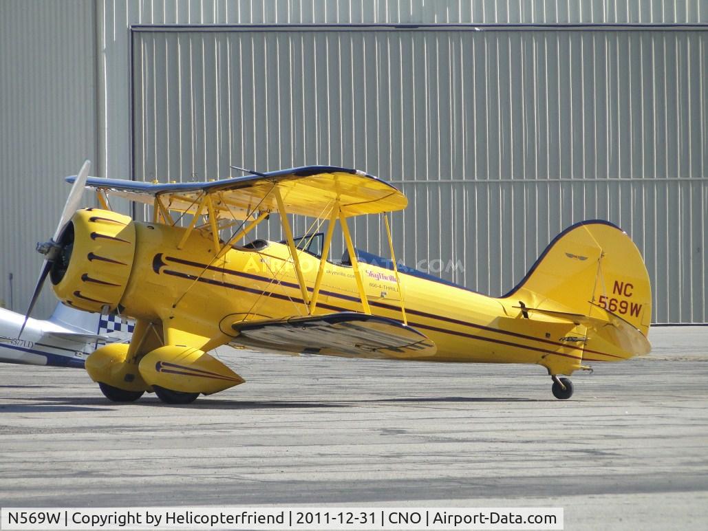 N569W, 1996 Classic Aircraft Corp WACO YMF C/N F5C-069, Parked in the area by the paint shop