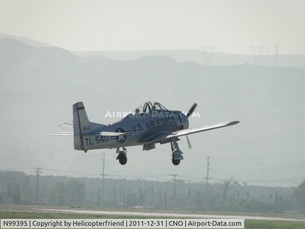 N99395, 1945 North American T-28A Trojan C/N 49-1540A, Completed touch & go and is airbourne from runway 26R
