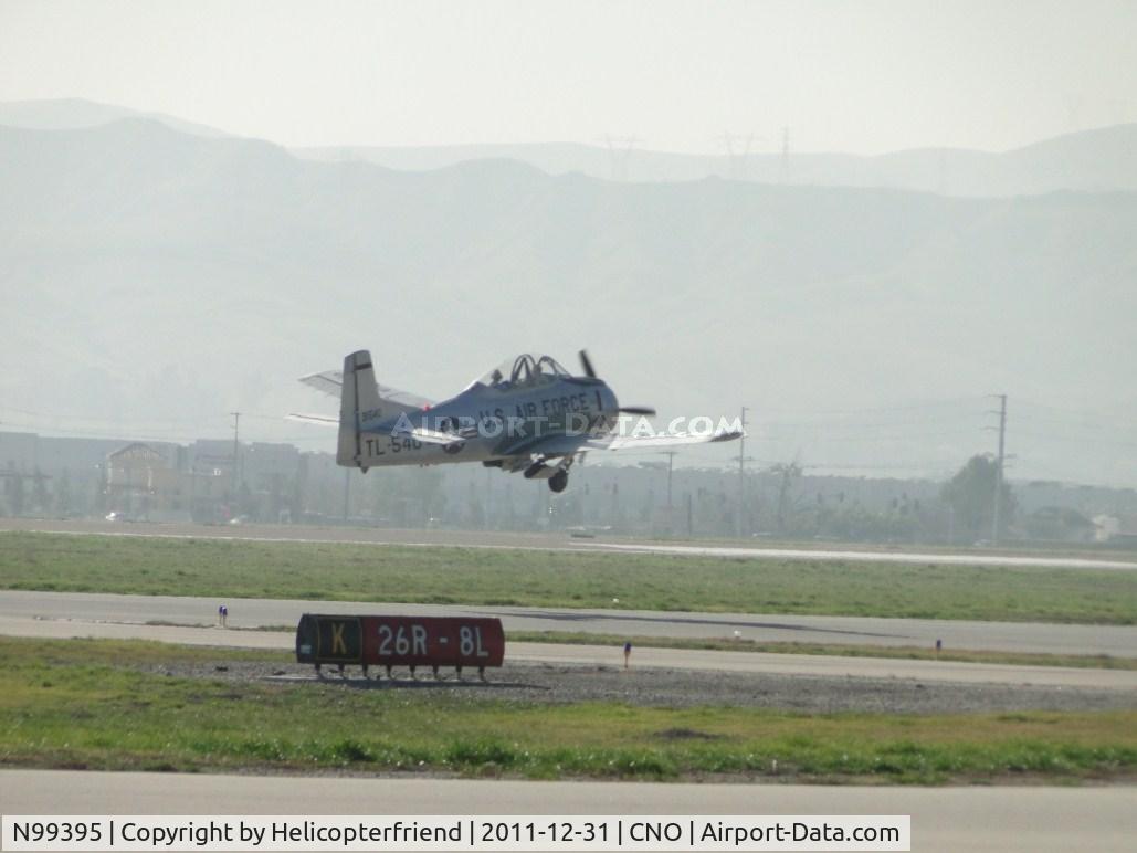 N99395, 1945 North American T-28A Trojan C/N 49-1540A, Lift off and quick retraction of landing gear