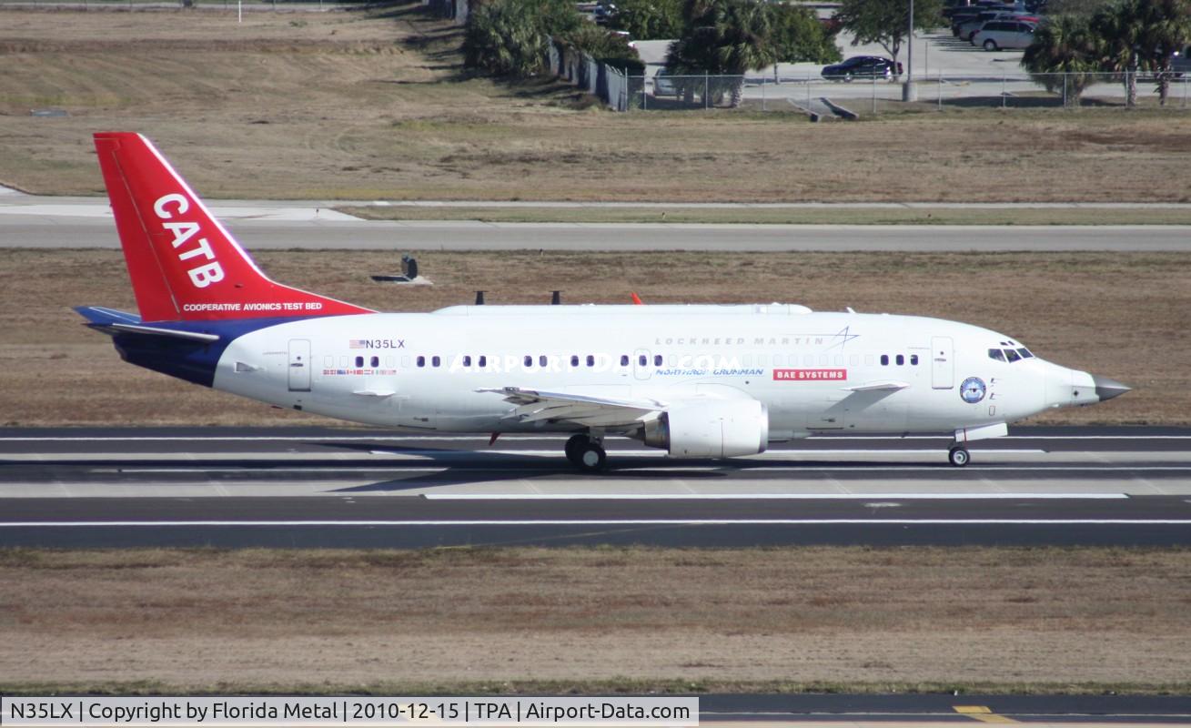 N35LX, 1986 Boeing 737-330 C/N 23528, Catbird departing at Tampa
