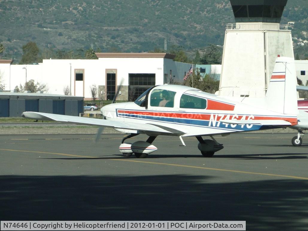N74646, 1976 Grumman American AA-5B Tiger C/N AA5B-0318, Taxiing out of transient parking turning west onto taxiway Sierra