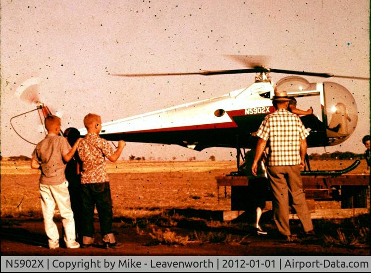 N5902X, 1960 Brantly B-2 C/N 37, From a box of Found slides - date shopuld be about July 1960.  This also gets towed in a parade.  Notye that the blades are moving and there is NO safety zone!