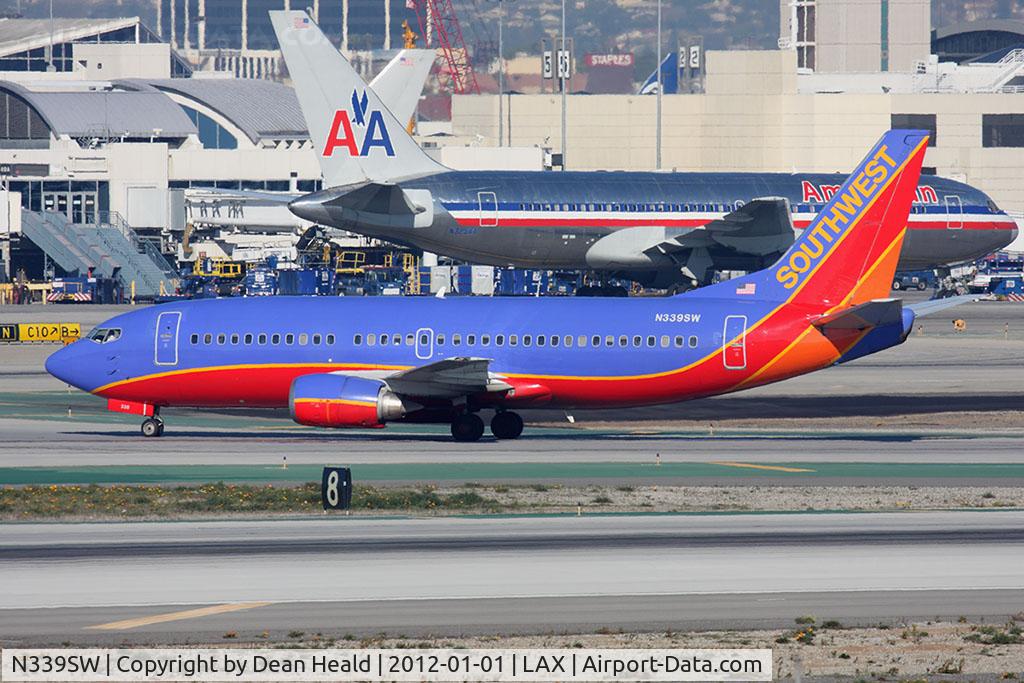 N339SW, 1988 Boeing 737-3H4 C/N 24090, Southwest Airlines N339SW (FLT SWA103) from Kansas City Int'l (KMCI) taxiing after arrival on RWY 25L.