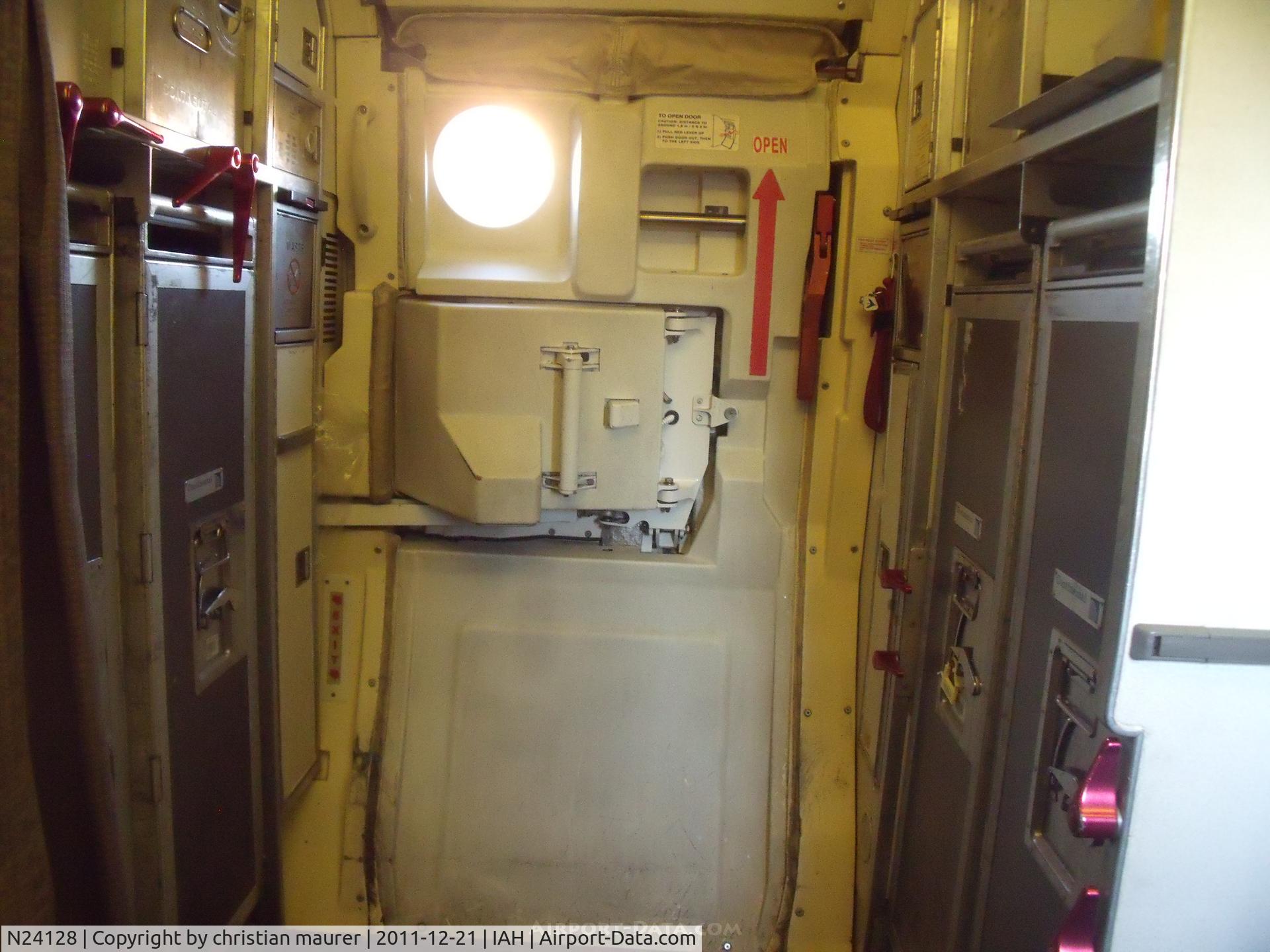 N24128, 2003 Embraer ERJ-145XR (EMB-145XR) C/N 145700, ERJ-145 Service door