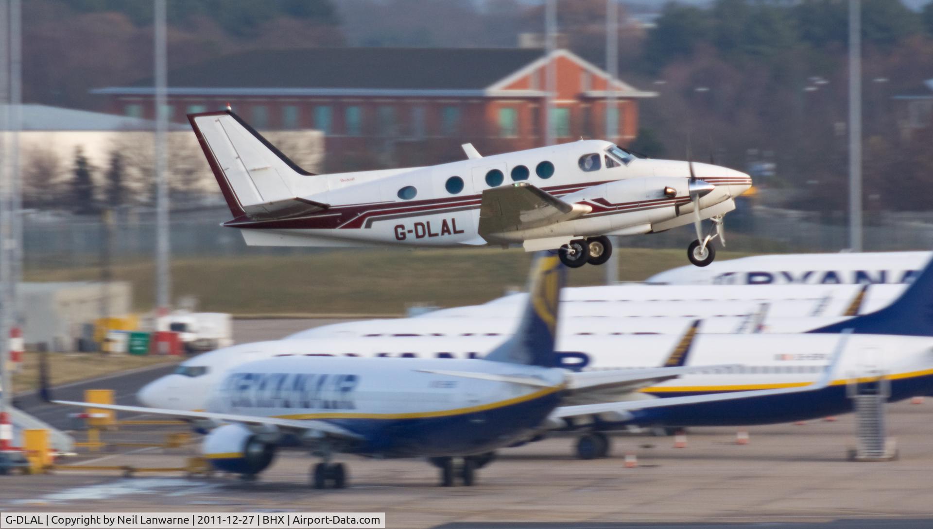 G-DLAL, 1976 Beech E90 King Air C/N LW-187, Taking off from runway 15, Birmingham
