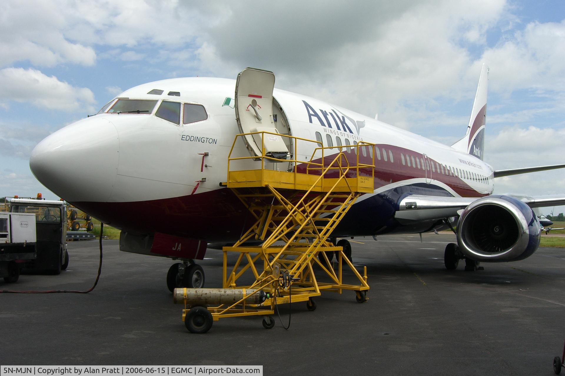 5N-MJN, 2009 Boeing 737-86N C/N 35638, carrying reg JA on nosewheel bay door  and name EDDINGTON and temporary reg N361UA